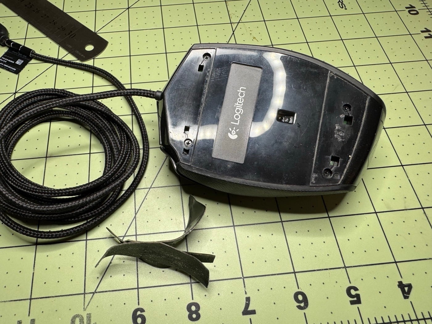 Underside of the mouse with the old skates removed